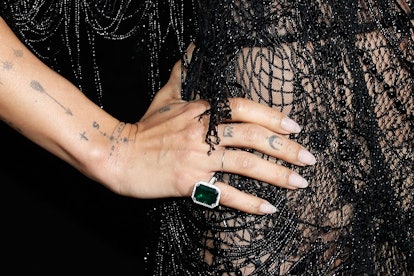 Zoë Kravitz tattoos include a crown on her finger.
