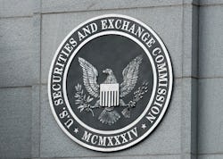 WASHINGTON - SEPTEMBER 18: The U.S. Securities and Exchange Commission seal hangs on the facade of ...