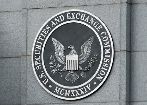 WASHINGTON - SEPTEMBER 18: The U.S. Securities and Exchange Commission seal hangs on the facade of ...
