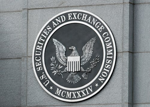 WASHINGTON - SEPTEMBER 18:  The U.S. Securities and Exchange Commission seal hangs on the facade of ...
