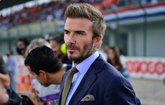 Former England footballer David Beckham is pictured on the grid ahead of the Qatari Formula One Gran...