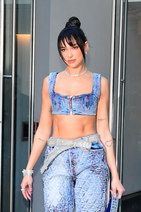 Singer Dua Lipa wearing a full denim outfit