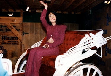 American singer Selena (born Selena Quintanilla-Perez, 1971 - 1995) rides in a carriage during a per...