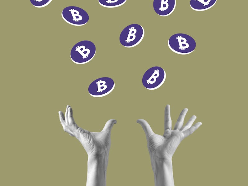 Hands catching Bitcoin coins that are falling