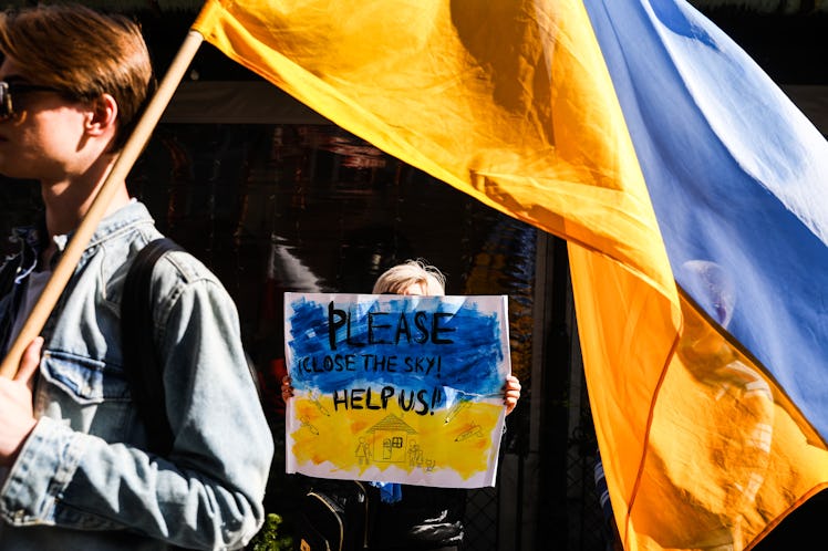 Ukrainian citizens and supporters attend a demonstration of solidarity with Ukraine in front of the ...