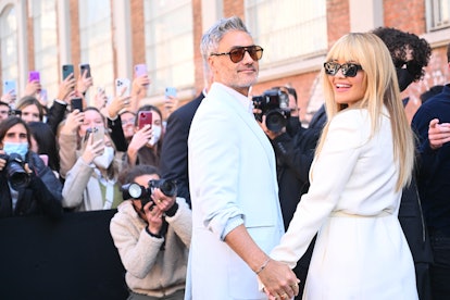 MILAN, ITALY - FEBRUARY 23: Taika Waititi and Rita Ora are seen arriving at the Fendi fashion show d...