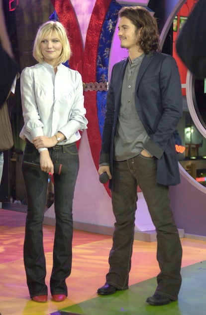 Kirsten Dunst and Orlando Bloom during Kirsten Dunst and Orlando Bloom Visit MTV's "TRL" - October 1...