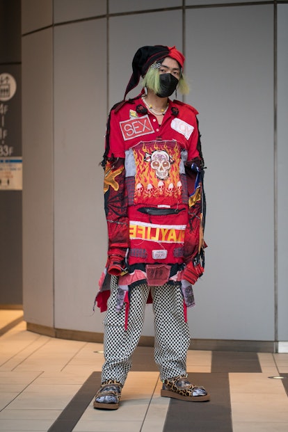 TOKYO, JAPAN - MARCH 18: Yu Masui is seen wearing Jonty Kristian Mellmann tunic, doublet socks, SUIC...