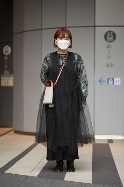 TOKYO, JAPAN - MARCH 15: A guest is seen wearing black sheer dress outside Shibuya Hikarie during Ra...
