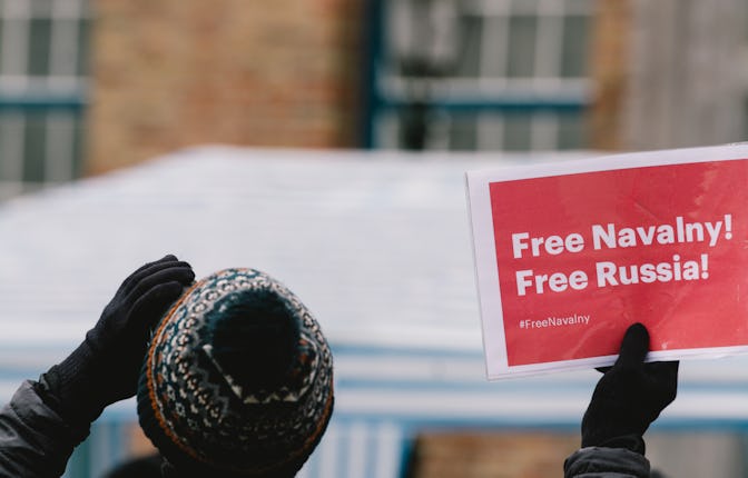 sign of &quot; Free navalny, Free Russia&quot; is seen during the Free navalny protest in Duesseldor...
