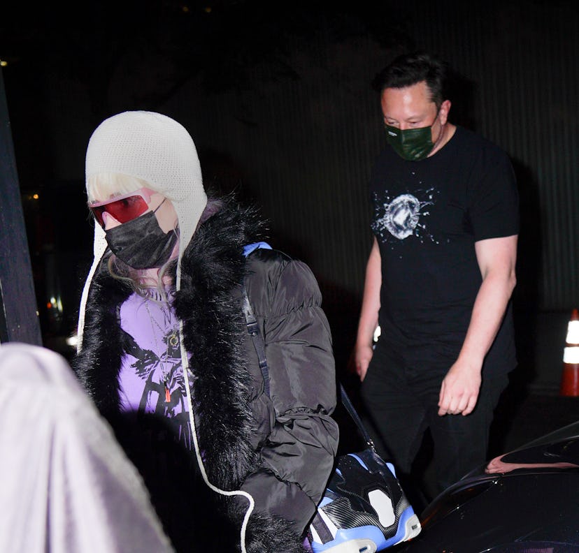 NEW YORK, NEW YORK - MAY 04: Elon Musk and his girlfriend Grimes head for dinner on May 04, 2021 in …