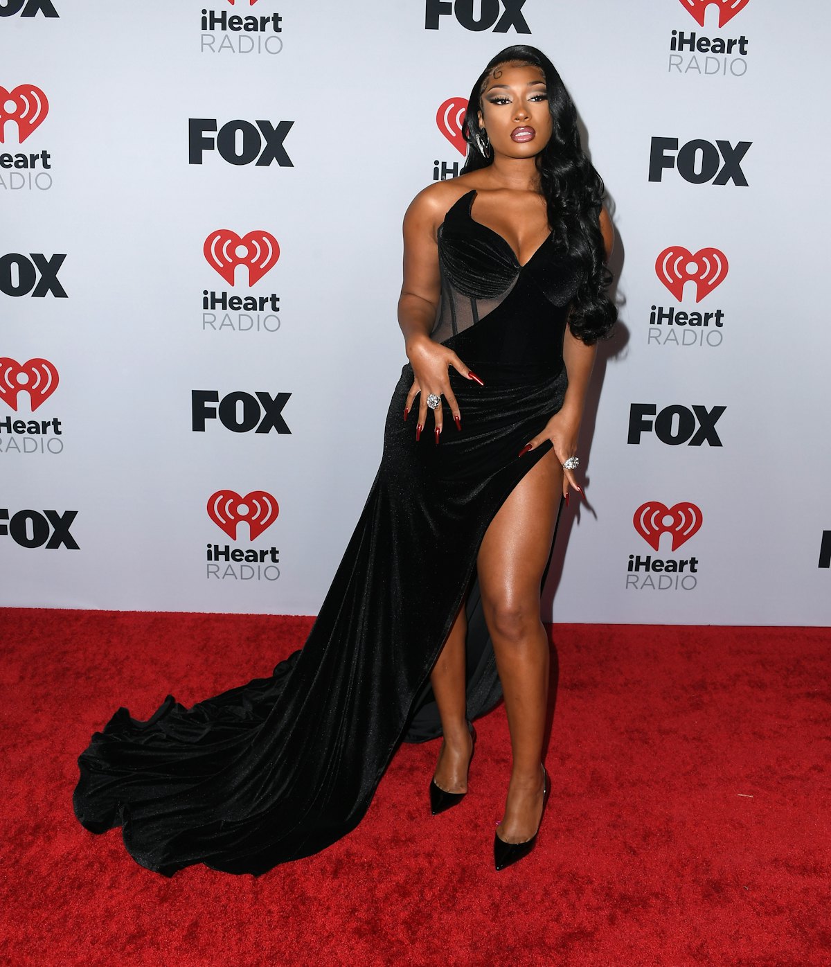 LOS ANGELES, CALIFORNIA - MARCH 22: Megan Thee Stallion arrives at the 2022 iHeartRadio Music Awards...