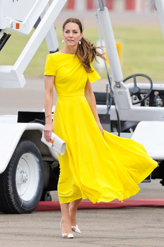 Kate Middleton wearing a yellow dress in Jamaica. 