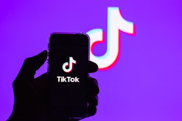 SPAIN - 2021/02/16: In this photo illustration, a Tik Tok app seen displayed on a smartphone with th...
