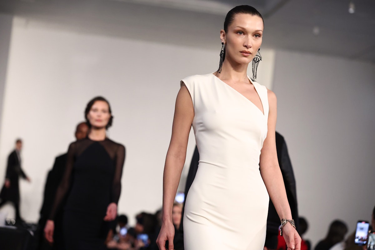 NEW YORK, NEW YORK - MARCH 22: Bella Hadid walks the runway at the Ralph Lauren Fall 2022 Fashion Sh...