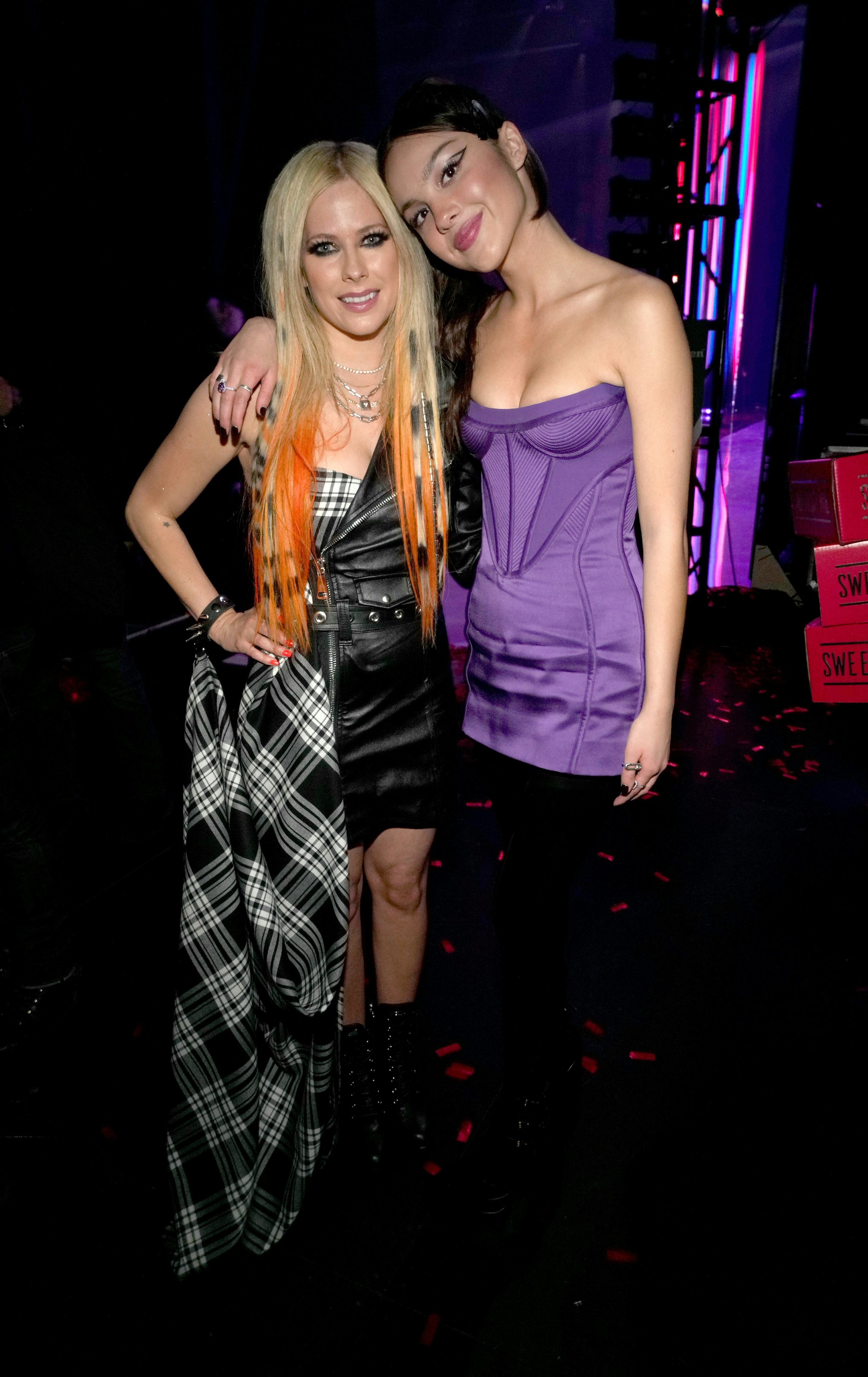 LOS ANGELES, CALIFORNIA - MARCH 22: (FOR EDITORIAL USE ONLY) (L-R) Avril Lavigne and Olivia Rodrigo ...