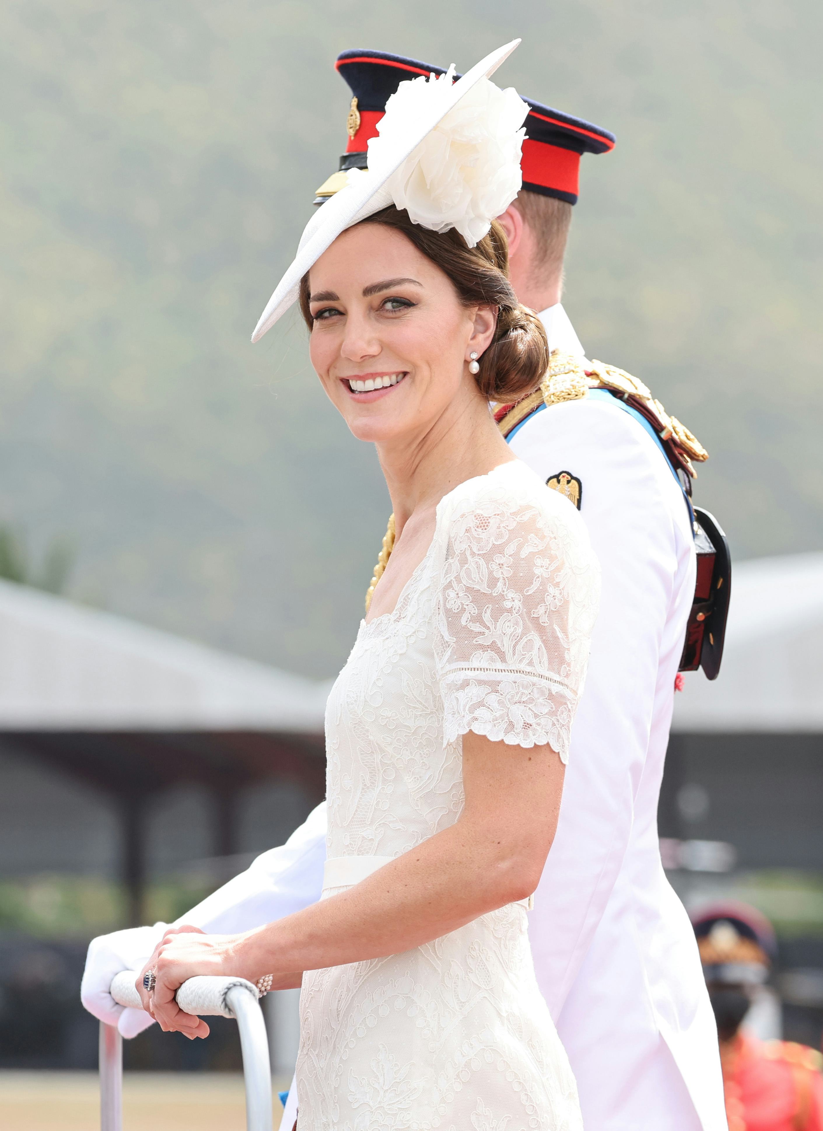 KINGSTON, JAMAICA – MARCH 24: Catherine, Duchess of Cambridge smiles as she attends the inaugural Co...
