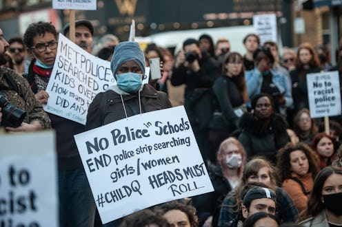 LONDON, ENGLAND - MARCH 17: Hundreds of people block the A10 and put posters on the Police Station o...