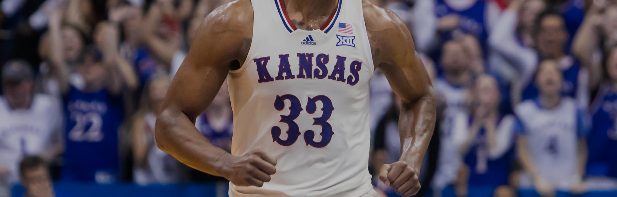 LAWRENCE, KS - MARCH 05: Kansas Jayhawks forward David McCormack (33) celebrates an offensive score ...