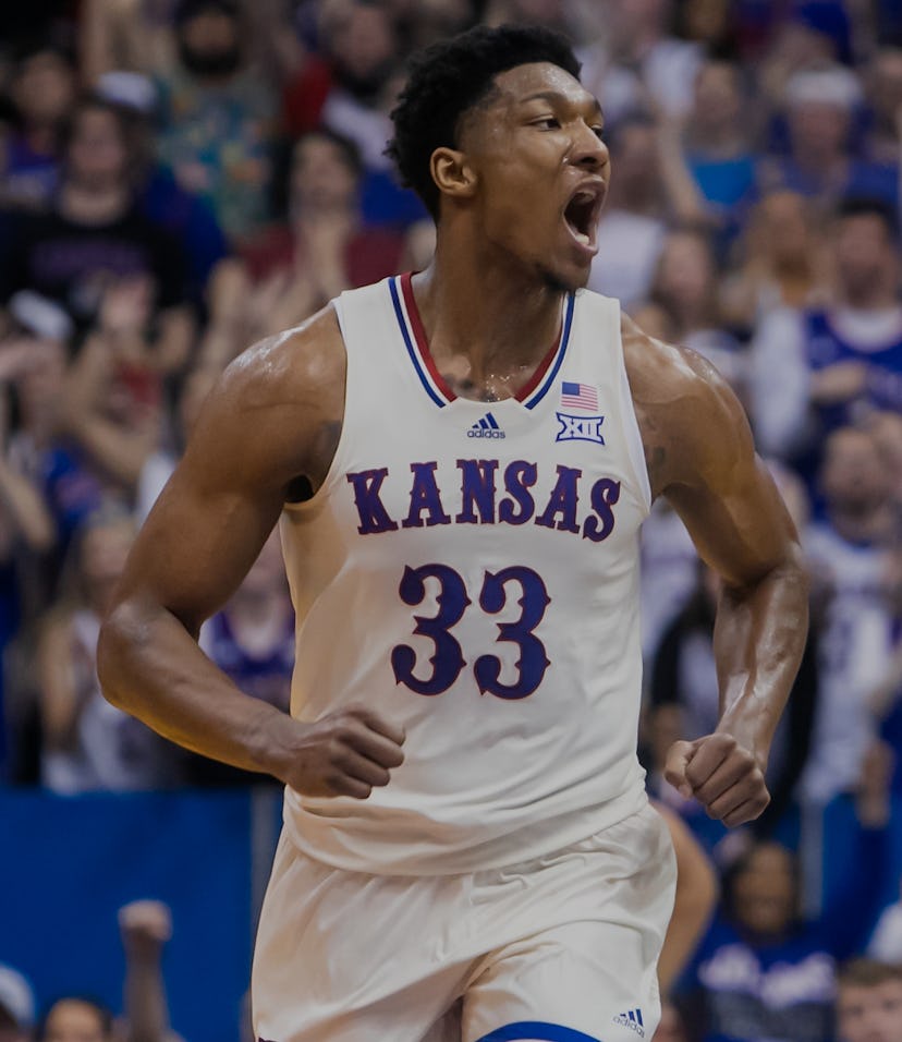 LAWRENCE, KS - MARCH 05: Kansas Jayhawks forward David McCormack (33) celebrates an offensive score ...
