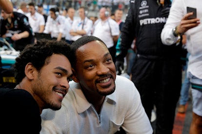 US actor Will Smith (R) and his son Trey visit the pit lane during the Abu Dhabi Formula One Grand P...