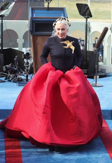 Lady Gaga walks back after singing the National Anthem during the inauguration of Joe Biden 