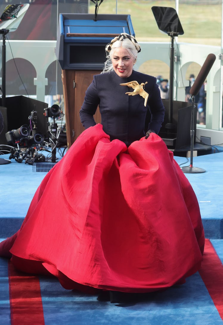 Lady Gaga walks back after singing the National Anthem during the inauguration of Joe Biden 