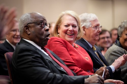 WASHINGTON, DC - OCTOBER 21: (L-R) Associate Supreme Court Justice Clarence Thomas sits with his wif...
