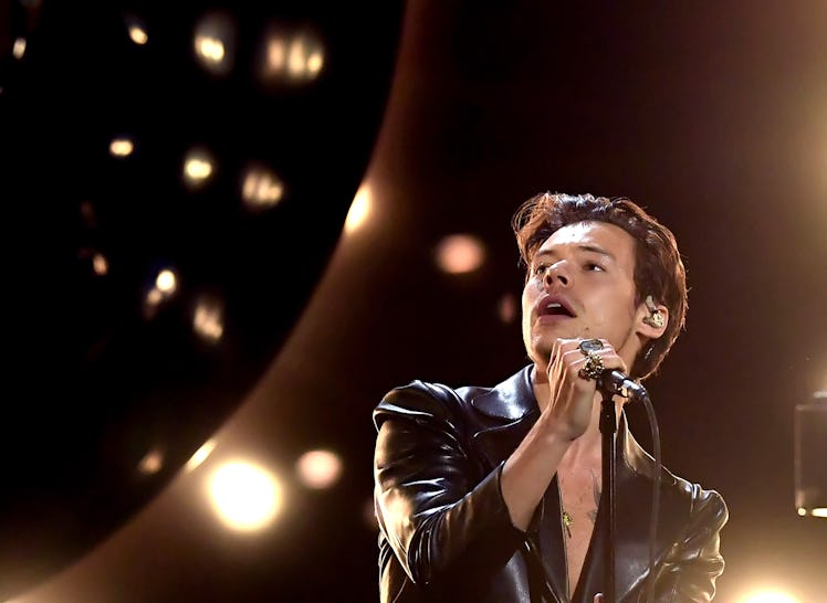 Harry Styles on stage during his 'Love On Tour.' Fans are sharing theories about his upcoming new al...