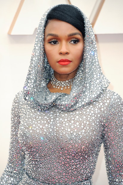 Janelle Monae made heads turn with her side part and rhinestone embellished hood.