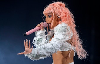 US rapper Doja Cat performs on stage at the Lollapalooza 2022 music festival in Santiago, on March 2...