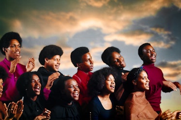 1980s Young African-American Men And Women In  Gospel Choir Singing In Front Of A Sunrise Scene   (P...