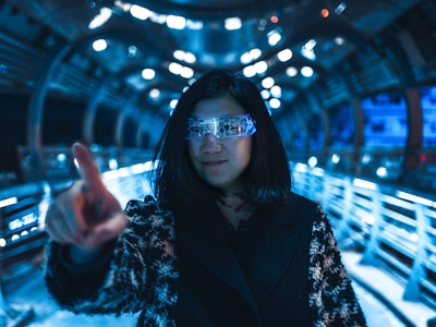 Woman with Futuristic glasses, Virtual Reality and Metaverse concept