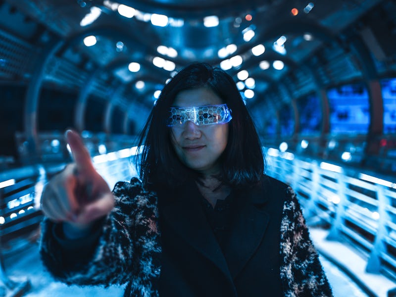 Woman with Futuristic glasses, Virtual Reality and Metaverse concept