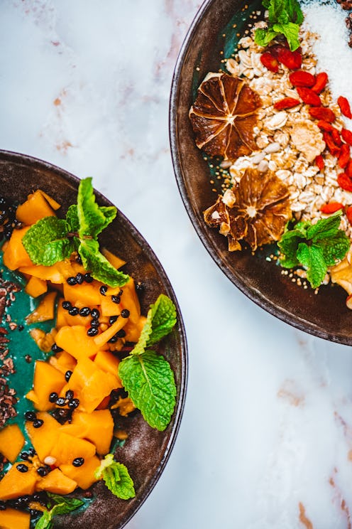 Green Spirulina Smoothie Bowl with different toppings