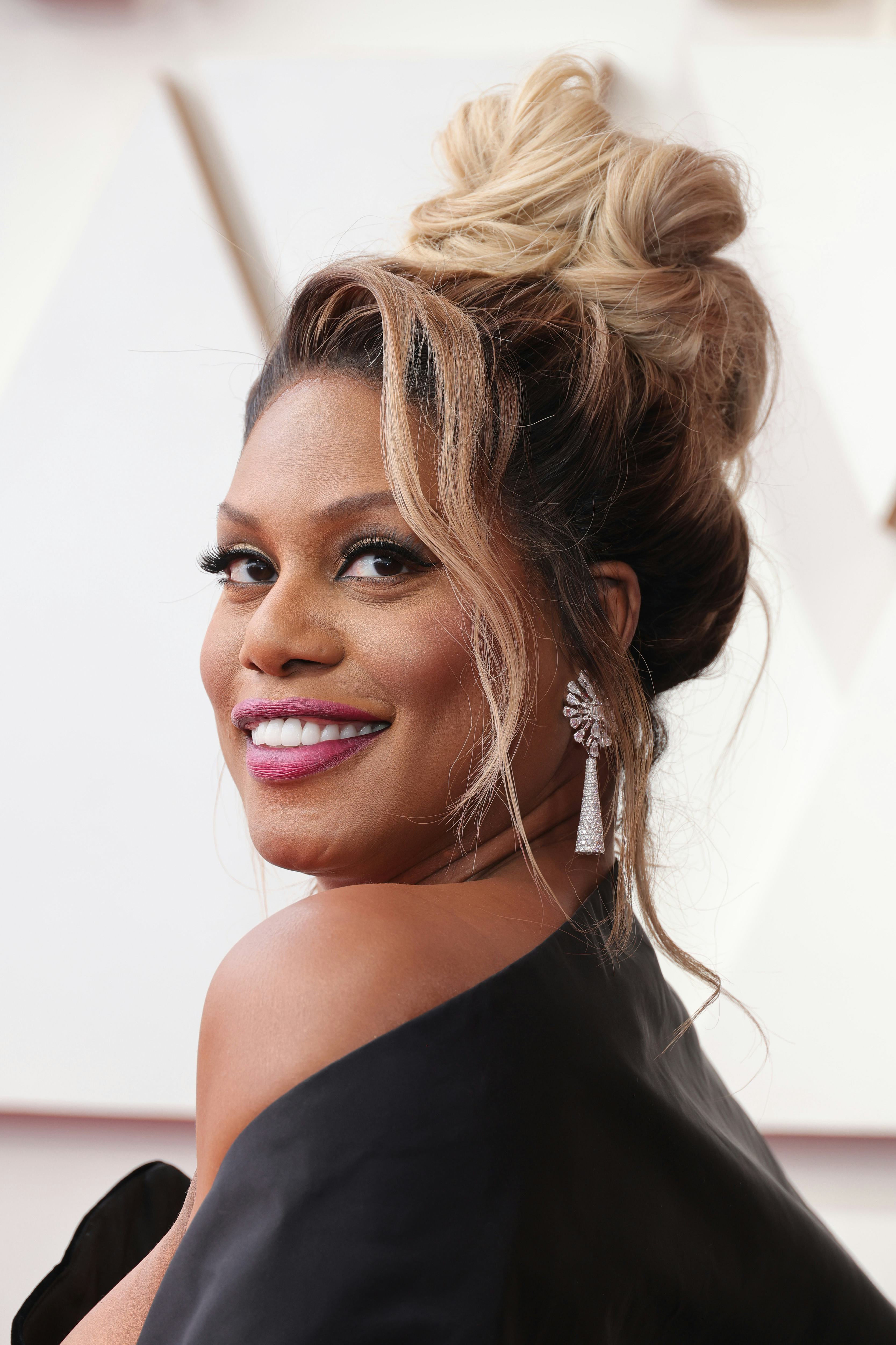 Twitter reacted to Laverne Cox as E!'s correspondent for the 2022 Oscars red carpet.