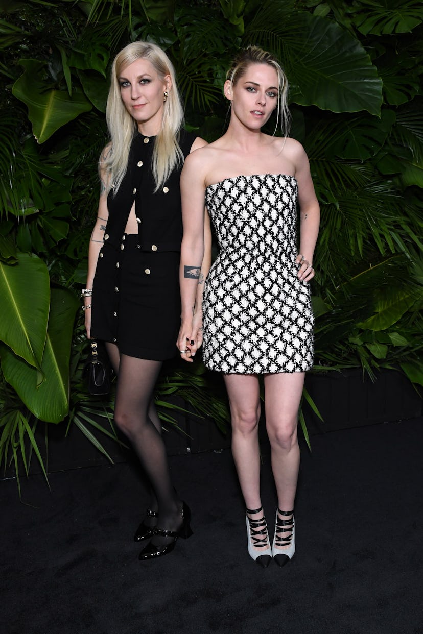 BEVERLY HILLS, CALIFORNIA - MARCH 26: (L-R) Dylan Meyer and Kristen Stewart attend the CHANEL and Ch...
