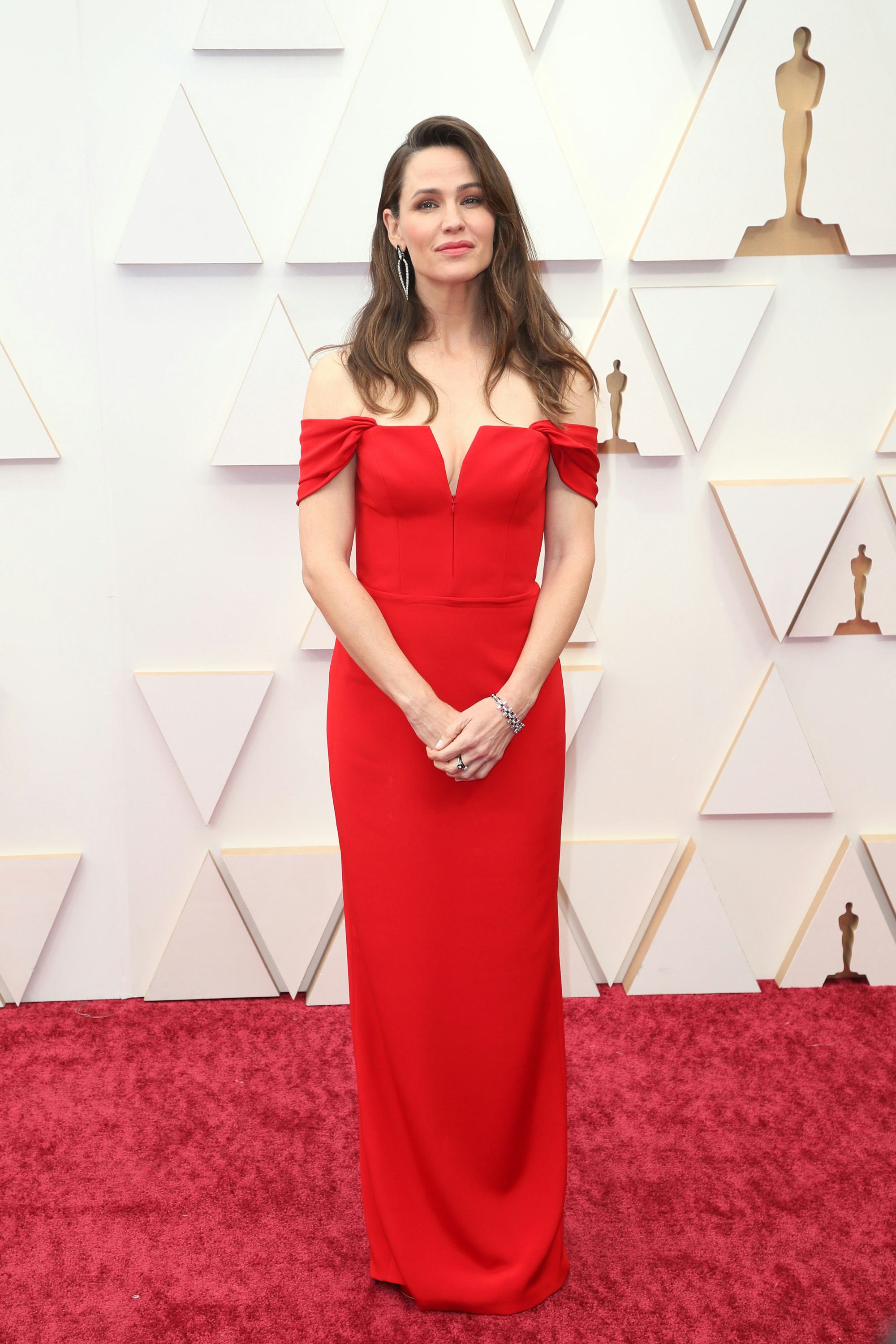 The 2022 Oscars red carpet was full of celebrities in red outfits. Here, Jennifer Garner.