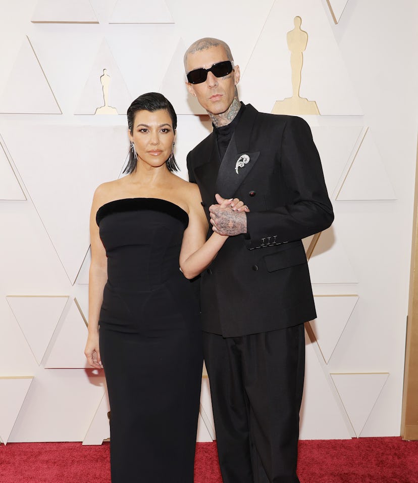 Kourtney Kardashian and Travis Barker shared a classic Kravis PDA moment on the 2022 Oscars red carp...