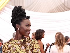 Lupita Nyong'o had the most relatable reaction to the apparent fight between Will Smith and Chris Ro...