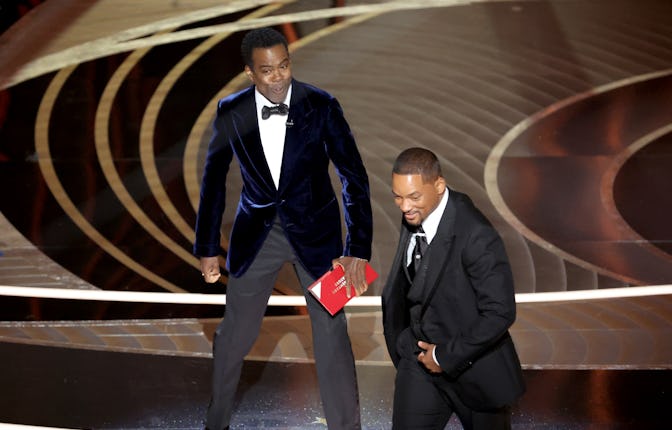 HOLLYWOOD, CA - March 27, 2022.    Chris Rock and Will Smith onstage during the show  at the 94th Ac...