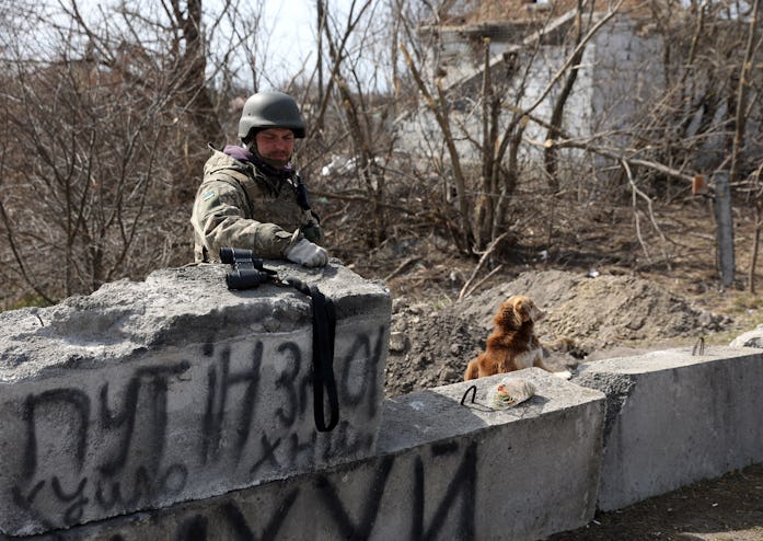 A Ukrainian soldier stands in a village on the frontline of the northern part of Kyiv region, on Mar...