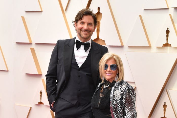 US actor and director Bradley Cooper and his mother Gloria Campano attend the 94th Oscars at the Dol...