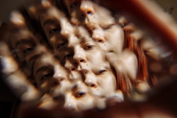 A woman's face is refracted through a kaleidoscope. Here's the meaning of angel number 999.