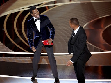 HOLLYWOOD, CA - March 27, 2022.    Chris Rock and Will Smith onstage during the show  at the 94th Ac...