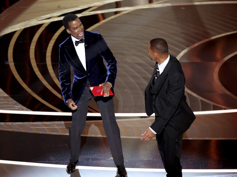 HOLLYWOOD, CA - March 27, 2022. Chris Rock and Will Smith onstage during the show at the 94th Ac...