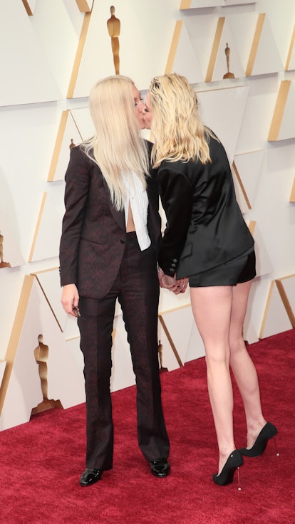 Dylan Meyer and Kristen Stewart wearing Chanel attend the 94th Annual Academy Awards