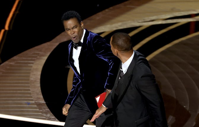 HOLLYWOOD, CALIFORNIA - MARCH 27: Will Smith appears to slap Chris Rock onstage during the 94th Annu...