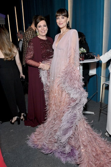 Olivia Colman and Dakota Johnson attend the 2022 Vanity Fair Oscar Party