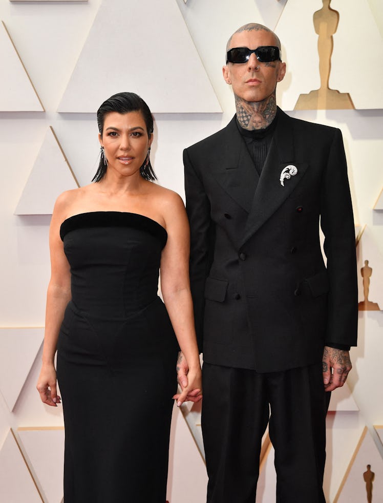 Kourtney Kardashian(L) and Travis Barker attend the 94th Oscars at the Dolby Theatre in Hollywood, C...